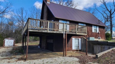 NEW PRICE on This Charming 1 1/5 Story A Frame Cabin, 2 possible on Terre Du Lac Golf and Country Club in Missouri - for sale on GolfHomes.com, golf home, golf lot