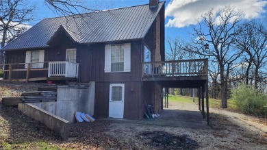 NEW PRICE on This Charming 1 1/5 Story A Frame Cabin, 2 possible on Terre Du Lac Golf and Country Club in Missouri - for sale on GolfHomes.com, golf home, golf lot