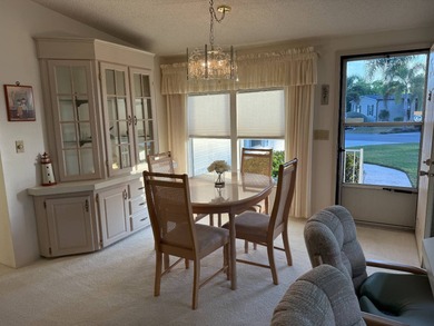 Priced to sell at $38,500, monthly lot rent is $1248 on Pine Lakes Country Club in Florida - for sale on GolfHomes.com, golf home, golf lot