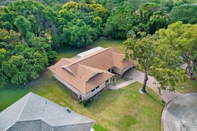 Welcome to this spacious 3-bedroom, 3-bath home on a large on Beacon Woods Golf Club in Florida - for sale on GolfHomes.com, golf home, golf lot
