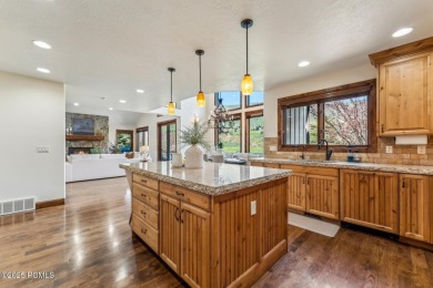 The custom-built residence oozes curb appeal from every angle on Jeremy Golf and Country Club in Utah - for sale on GolfHomes.com, golf home, golf lot