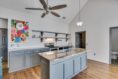 Blending designer updates with architectural appeal, this on Woodside Plantation Country Club in South Carolina - for sale on GolfHomes.com, golf home, golf lot