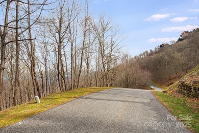 Experience high-elevation mountain living at its finest on this on Wolf Laurel Country Club in North Carolina - for sale on GolfHomes.com, golf home, golf lot