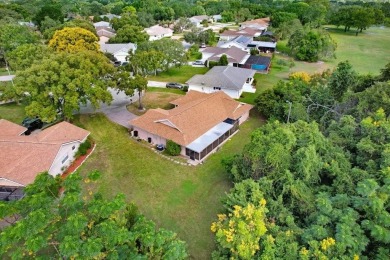 Welcome to this spacious 3-bedroom, 3-bath home on a large on Beacon Woods Golf Club in Florida - for sale on GolfHomes.com, golf home, golf lot