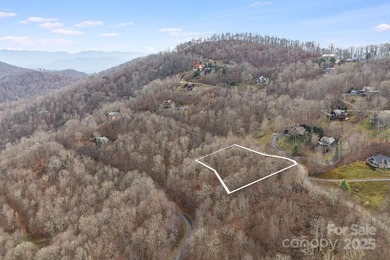Experience high-elevation mountain living at its finest on this on Wolf Laurel Country Club in North Carolina - for sale on GolfHomes.com, golf home, golf lot