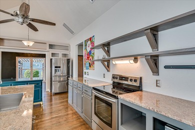 Blending designer updates with architectural appeal, this on Woodside Plantation Country Club in South Carolina - for sale on GolfHomes.com, golf home, golf lot