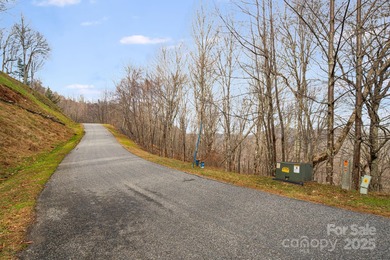 Experience high-elevation mountain living at its finest on this on Wolf Laurel Country Club in North Carolina - for sale on GolfHomes.com, golf home, golf lot