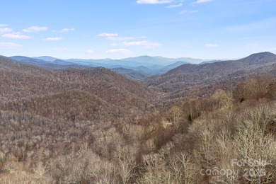 Experience high-elevation mountain living at its finest on this on Wolf Laurel Country Club in North Carolina - for sale on GolfHomes.com, golf home, golf lot