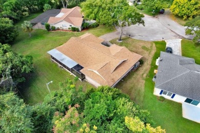 Welcome to this spacious 3-bedroom, 3-bath home on a large on Beacon Woods Golf Club in Florida - for sale on GolfHomes.com, golf home, golf lot