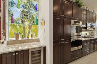 Experience luxury, privacy, and sophistication in this stunning on Lakewood Ranch Golf and Country Club in Florida - for sale on GolfHomes.com, golf home, golf lot