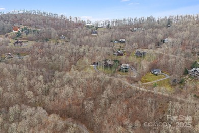 Experience high-elevation mountain living at its finest on this on Wolf Laurel Country Club in North Carolina - for sale on GolfHomes.com, golf home, golf lot