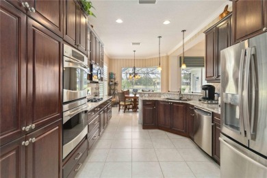 Experience luxury, privacy, and sophistication in this stunning on Lakewood Ranch Golf and Country Club in Florida - for sale on GolfHomes.com, golf home, golf lot