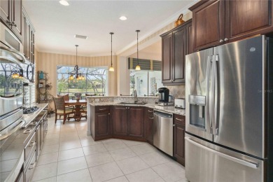 Experience luxury, privacy, and sophistication in this stunning on Lakewood Ranch Golf and Country Club in Florida - for sale on GolfHomes.com, golf home, golf lot