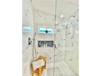 This gorgeous home was completely remodeled in 2023. THIS IS A on Indianwood Golf and Country Club in Florida - for sale on GolfHomes.com, golf home, golf lot