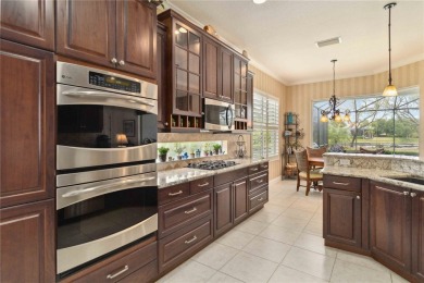 Experience luxury, privacy, and sophistication in this stunning on Lakewood Ranch Golf and Country Club in Florida - for sale on GolfHomes.com, golf home, golf lot