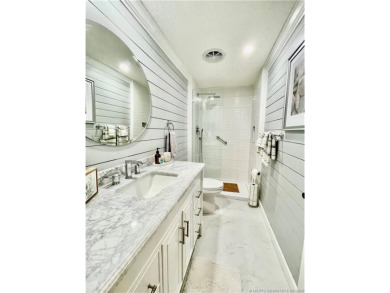 This gorgeous home was completely remodeled in 2023. THIS IS A on Indianwood Golf and Country Club in Florida - for sale on GolfHomes.com, golf home, golf lot