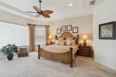 Experience luxury, privacy, and sophistication in this stunning on Lakewood Ranch Golf and Country Club in Florida - for sale on GolfHomes.com, golf home, golf lot