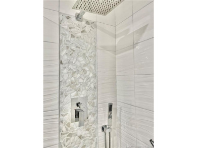 This gorgeous home was completely remodeled in 2023. THIS IS A on Indianwood Golf and Country Club in Florida - for sale on GolfHomes.com, golf home, golf lot