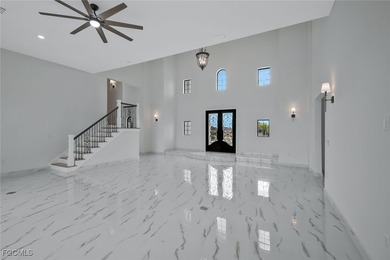 Gulf Access Lakefront Luxury Estate - New Construction 5 Bedroom on Burnt Store Golf Club in Florida - for sale on GolfHomes.com, golf home, golf lot