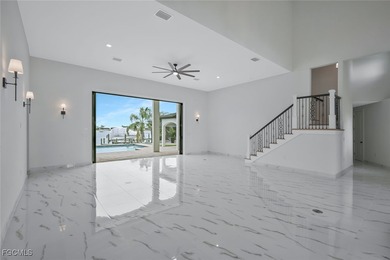 Gulf Access Lakefront Luxury Estate - New Construction 5 Bedroom on Burnt Store Golf Club in Florida - for sale on GolfHomes.com, golf home, golf lot