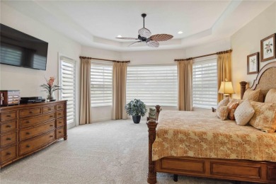 Experience luxury, privacy, and sophistication in this stunning on Lakewood Ranch Golf and Country Club in Florida - for sale on GolfHomes.com, golf home, golf lot