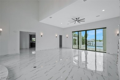 Gulf Access Lakefront Luxury Estate - New Construction 5 Bedroom on Burnt Store Golf Club in Florida - for sale on GolfHomes.com, golf home, golf lot