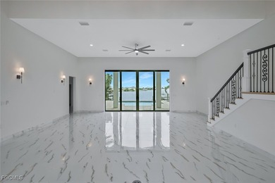 Gulf Access Lakefront Luxury Estate - New Construction 5 Bedroom on Burnt Store Golf Club in Florida - for sale on GolfHomes.com, golf home, golf lot