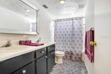 Welcome to this spacious 3-bedroom, 3-bath home on a large on Beacon Woods Golf Club in Florida - for sale on GolfHomes.com, golf home, golf lot
