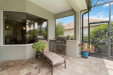 Experience luxury, privacy, and sophistication in this stunning on Lakewood Ranch Golf and Country Club in Florida - for sale on GolfHomes.com, golf home, golf lot