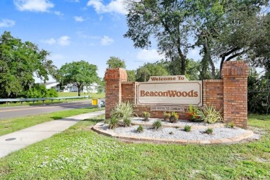 Welcome to this spacious 3-bedroom, 3-bath home on a large on Beacon Woods Golf Club in Florida - for sale on GolfHomes.com, golf home, golf lot