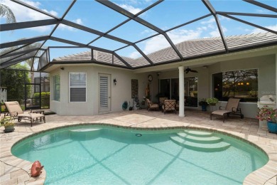 Experience luxury, privacy, and sophistication in this stunning on Lakewood Ranch Golf and Country Club in Florida - for sale on GolfHomes.com, golf home, golf lot