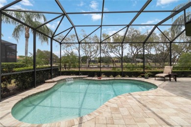 Experience luxury, privacy, and sophistication in this stunning on Lakewood Ranch Golf and Country Club in Florida - for sale on GolfHomes.com, golf home, golf lot