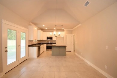 Welcome home to Bella Vista, just minutes from Lake Loch Lomond! on Bella Vista Country Club - Highlands in Arkansas - for sale on GolfHomes.com, golf home, golf lot