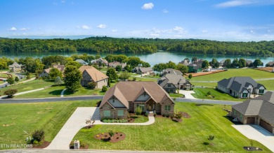 Step into a residence where sophistication meets serenity. This on Rarity Bay Country Club - Loudon in Tennessee - for sale on GolfHomes.com, golf home, golf lot
