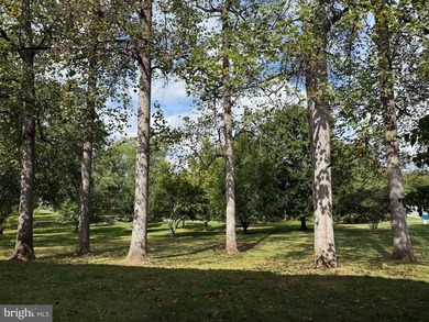 Welcome to your carefree living in this well-appointed and on Leisure World Golf Club in Maryland - for sale on GolfHomes.com, golf home, golf lot