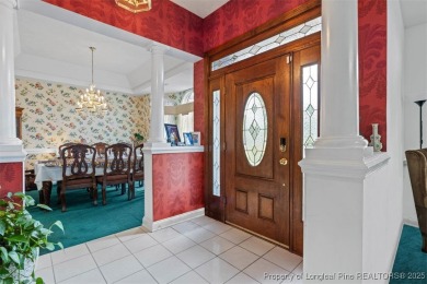 This beautifully maintained 3-bedroom, 3-bath all-brick home is on Baywood Golf Club in North Carolina - for sale on GolfHomes.com, golf home, golf lot