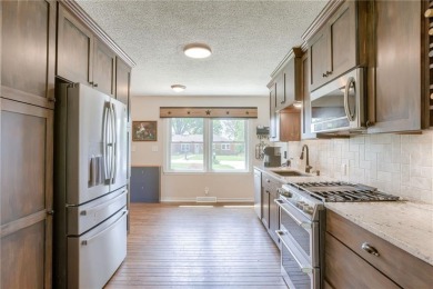 This updated home is in a quiet Park Hill School cul-de-sac on National Golf Club of Kansas City in Missouri - for sale on GolfHomes.com, golf home, golf lot