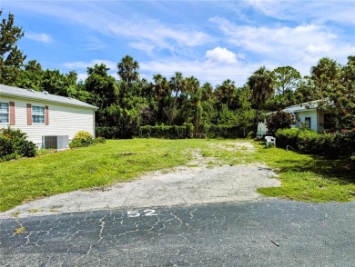 Vacant land in a mobile home community. This lot backs up to the on River Run Golf Links in Florida - for sale on GolfHomes.com, golf home, golf lot