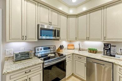 Welcome to this light and bright end-unit condo in the highly on The Preserve Golf Club At Tara in Florida - for sale on GolfHomes.com, golf home, golf lot