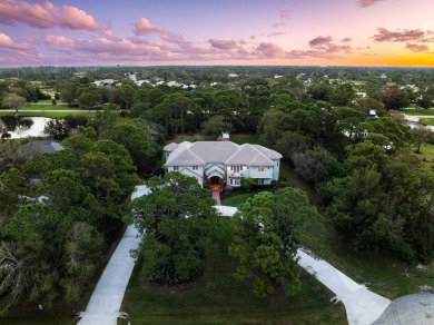 Spectacular estate pool home in the Sabal Creek community of PGA on The Legacy Golf and Tennis Club in Florida - for sale on GolfHomes.com, golf home, golf lot