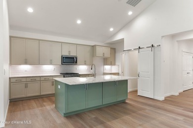 The Jasper has a welcoming interior with impressive vaulted on Prairie Falls Golf Club in Idaho - for sale on GolfHomes.com, golf home, golf lot