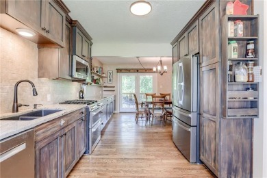 This updated home is in a quiet Park Hill School cul-de-sac on National Golf Club of Kansas City in Missouri - for sale on GolfHomes.com, golf home, golf lot