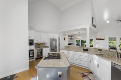 This custom, primarily one-level home features a striking on The Golf Club At Cedar Creek in South Carolina - for sale on GolfHomes.com, golf home, golf lot