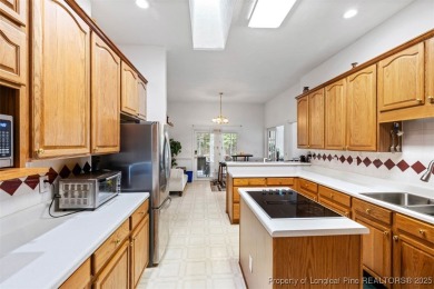 This beautifully maintained 3-bedroom, 3-bath all-brick home is on Baywood Golf Club in North Carolina - for sale on GolfHomes.com, golf home, golf lot
