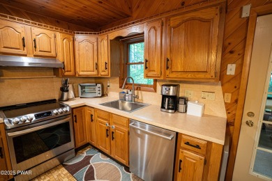 Discover this spacious contemporary home tucked away on a quiet on The Hideout Golf in Pennsylvania - for sale on GolfHomes.com, golf home, golf lot