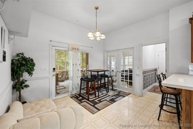 This beautifully maintained 3-bedroom, 3-bath all-brick home is on Baywood Golf Club in North Carolina - for sale on GolfHomes.com, golf home, golf lot