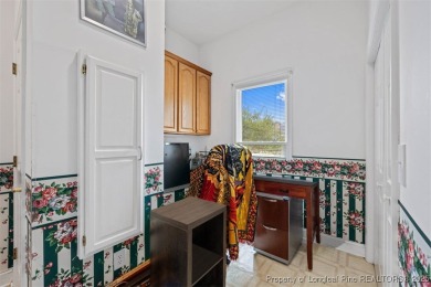 This beautifully maintained 3-bedroom, 3-bath all-brick home is on Baywood Golf Club in North Carolina - for sale on GolfHomes.com, golf home, golf lot