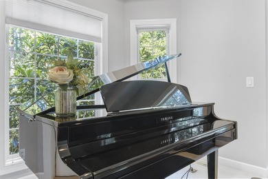 This custom, primarily one-level home features a striking on The Golf Club At Cedar Creek in South Carolina - for sale on GolfHomes.com, golf home, golf lot