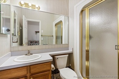 This beautifully maintained 3-bedroom, 3-bath all-brick home is on Baywood Golf Club in North Carolina - for sale on GolfHomes.com, golf home, golf lot