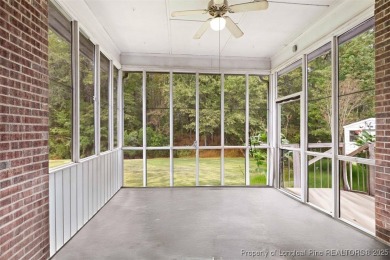 This beautifully maintained 3-bedroom, 3-bath all-brick home is on Baywood Golf Club in North Carolina - for sale on GolfHomes.com, golf home, golf lot